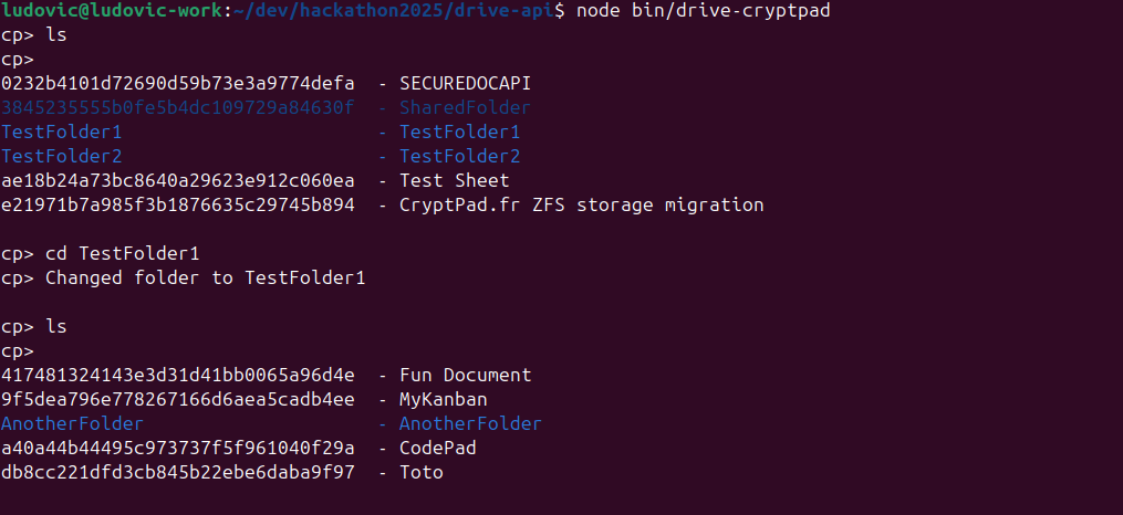 screenshot of a terminal showing a cryptpad client navigating a drive with cd and ls commands